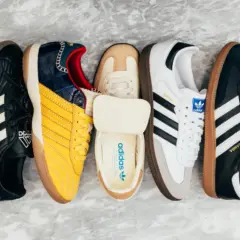 Pięć par butów Adidas, w tym klasyczne modele Samba w różnych kolorach i wariantach.