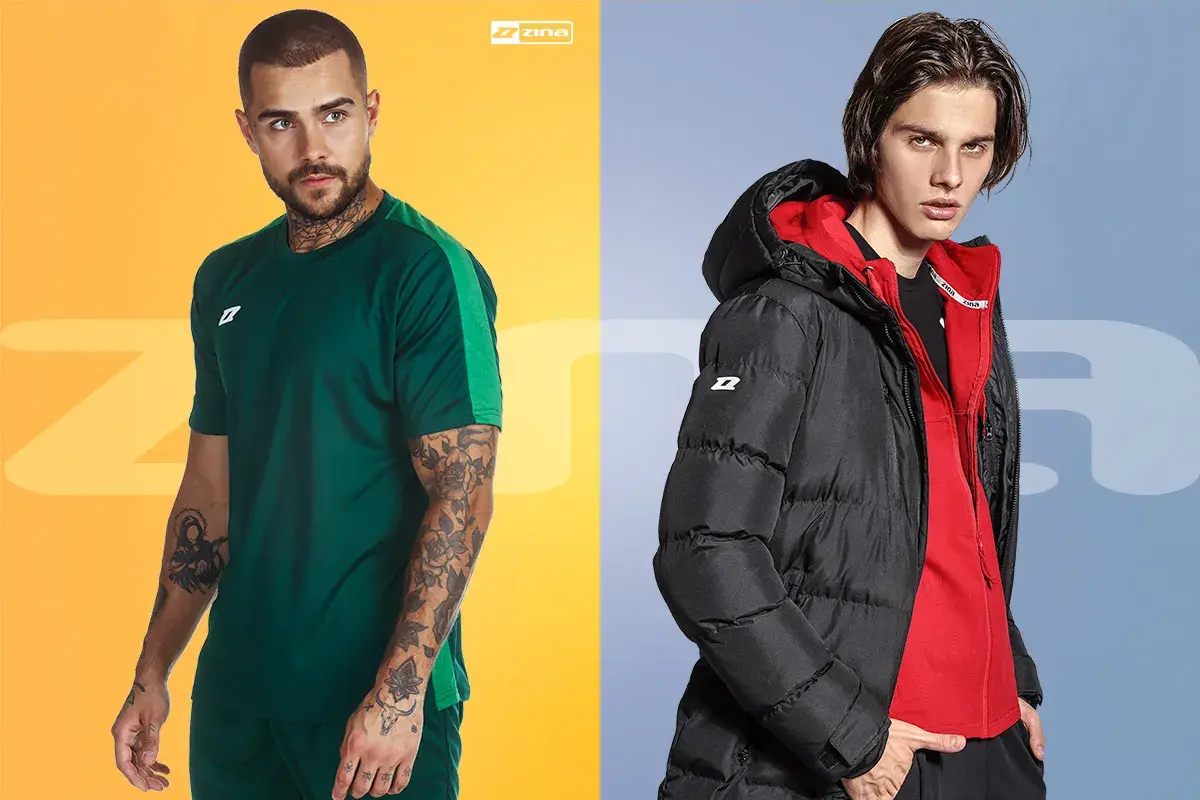 Dwóch mężczyzn w sportowych stylizacjach. Jeden w zielonej koszulce, drugi w czarnej, puchowej bluzie ortalionowej z czerwoną podszewką.